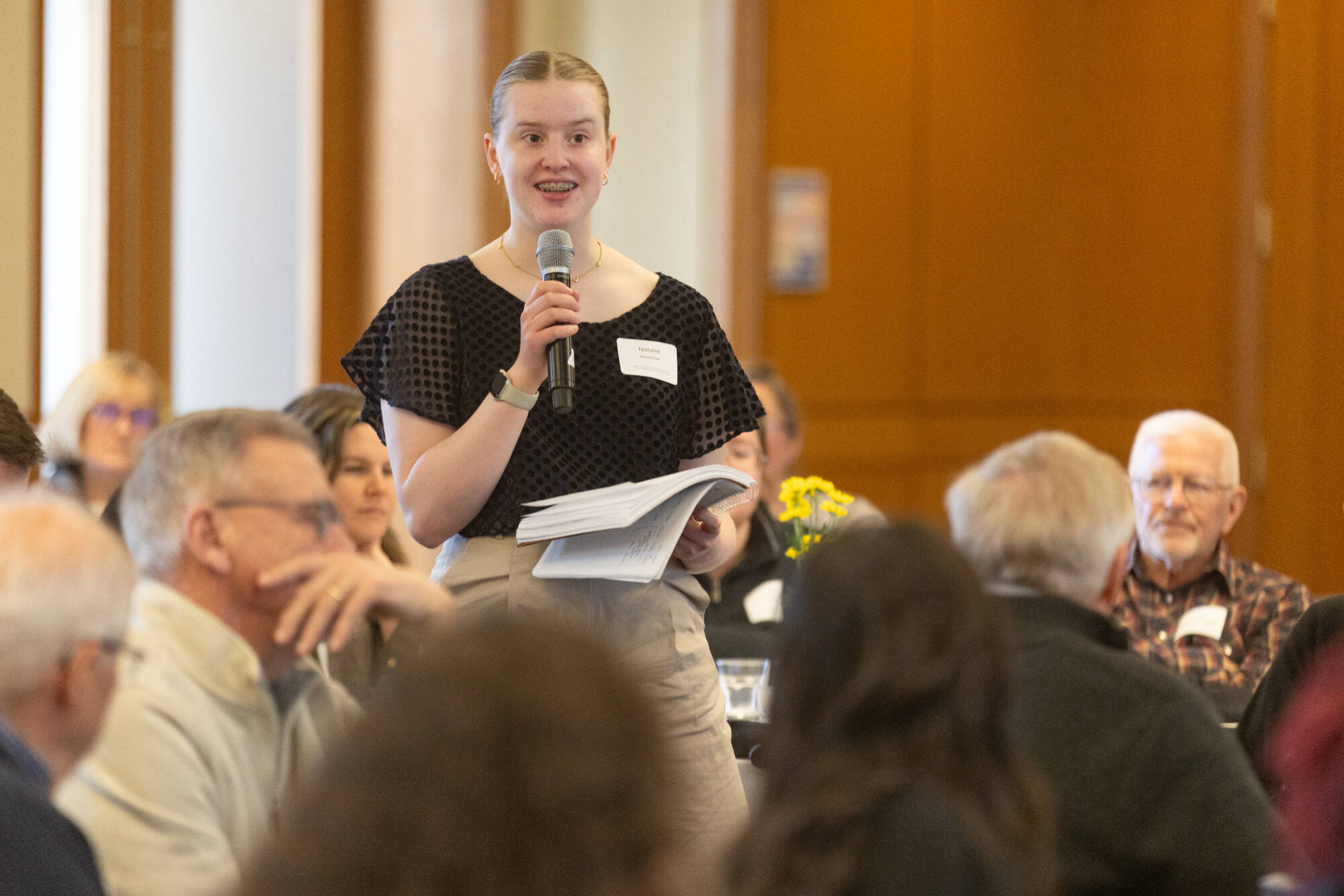 Student asks a question during an event.